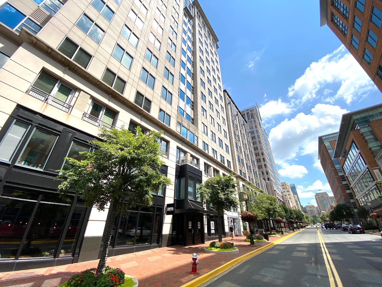 Vibrant cityscape capturing the modern architecture of Reston, Virginia on a sunny day.